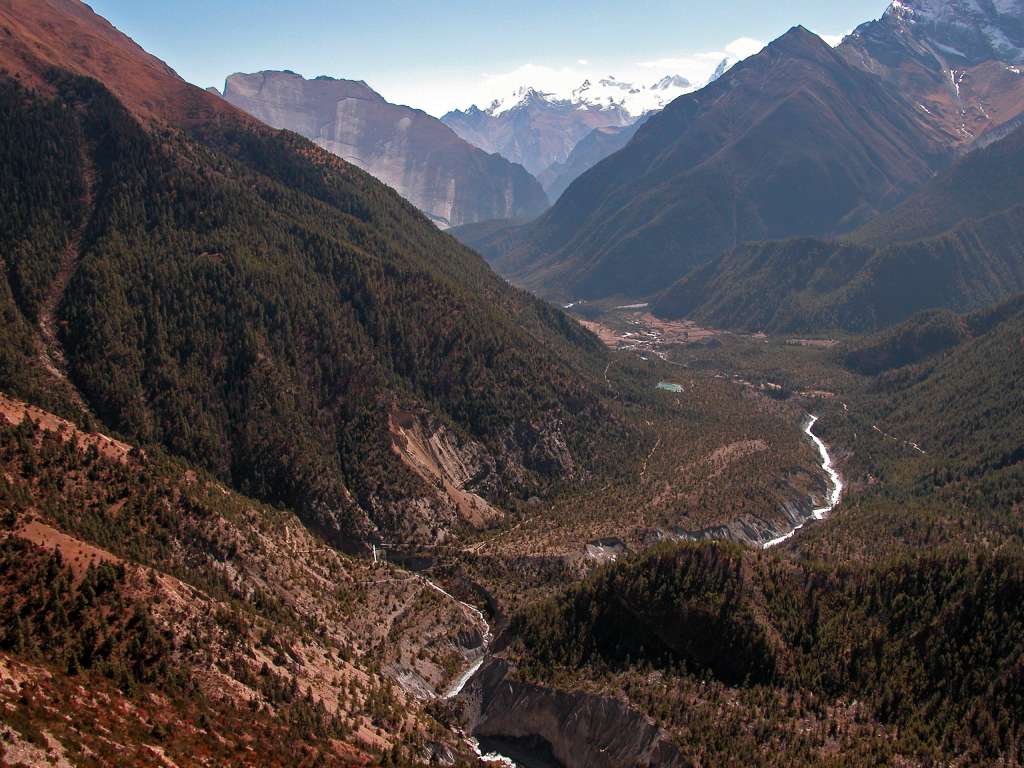 Annapurna 12 07 Marsyangdi River and Pisang From Ghyaru Looking back down the valley from Ghyaru, I could see the Marsyangdi River winding its way past Pisang and Paungda Danda towards Chame.